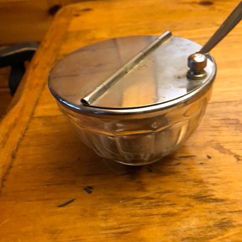 Antique sugar bowl with spoon
